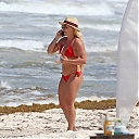 74002958_mandy-rose-the-26-year-old-wwe-star-displays-her-toned-figure-in-a-red-bikini.jpg