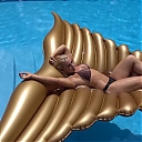 Mandy_Rose_poses_for_her_WWE_bikini_photo_shoot_mp40037.jpg