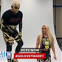 Mandy_Rose_shows_Goldust_how_to_improve_his_glutes_during_WWE_MMC_Second_Chance_Vote_mp40021.jpg
