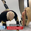 Mandy_Rose_shows_Goldust_how_to_improve_his_glutes_during_WWE_MMC_Second_Chance_Vote_mp40043.jpg