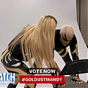 Mandy_Rose_shows_Goldust_how_to_improve_his_glutes_during_WWE_MMC_Second_Chance_Vote_mp40071.jpg