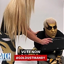 Mandy_Rose_shows_Goldust_how_to_improve_his_glutes_during_WWE_MMC_Second_Chance_Vote_mp40074.jpg