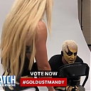 Mandy_Rose_shows_Goldust_how_to_improve_his_glutes_during_WWE_MMC_Second_Chance_Vote_mp40079.jpg