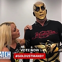 Mandy_Rose_shows_Goldust_how_to_improve_his_glutes_during_WWE_MMC_Second_Chance_Vote_mp40121.jpg