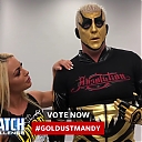 Mandy_Rose_shows_Goldust_how_to_improve_his_glutes_during_WWE_MMC_Second_Chance_Vote_mp40124.jpg